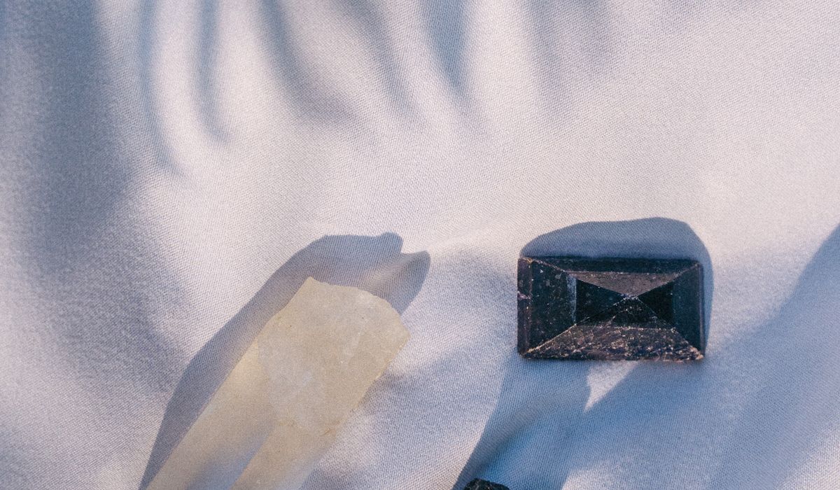 Using Rose Quartz to Create a Calm Bedside Table Display